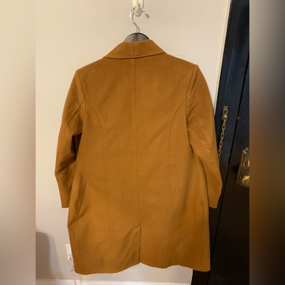 Beige knee length blazer